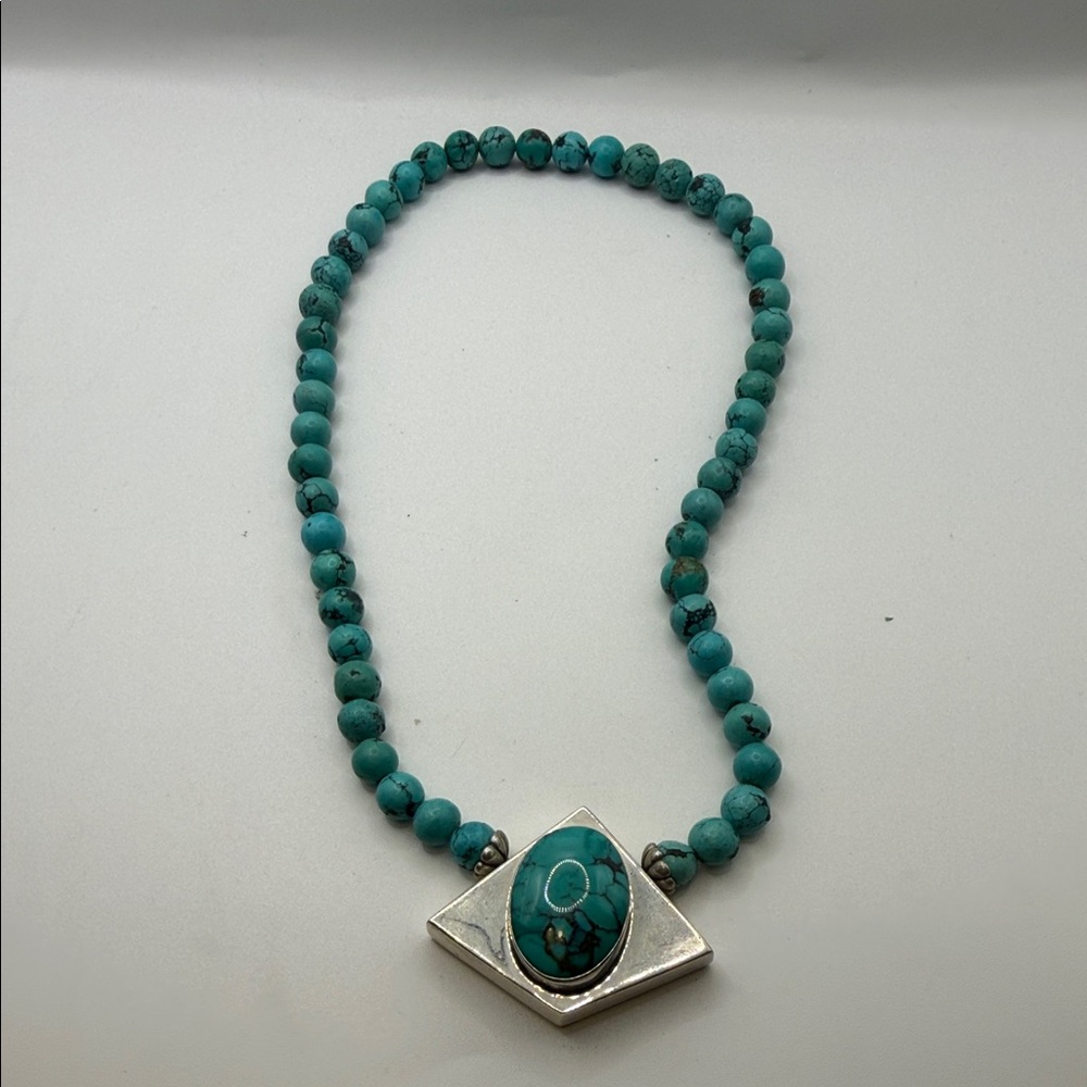 Turquoise Bead Necklace with Silver Accent Pendant